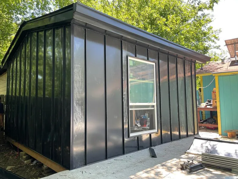 Black standing seam metal wall panels for Roof Inspection in Beatrice